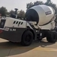 Самозагружающийся бетоносмеситель с шарнирно-сочлененной рамой XCMG SLM4V